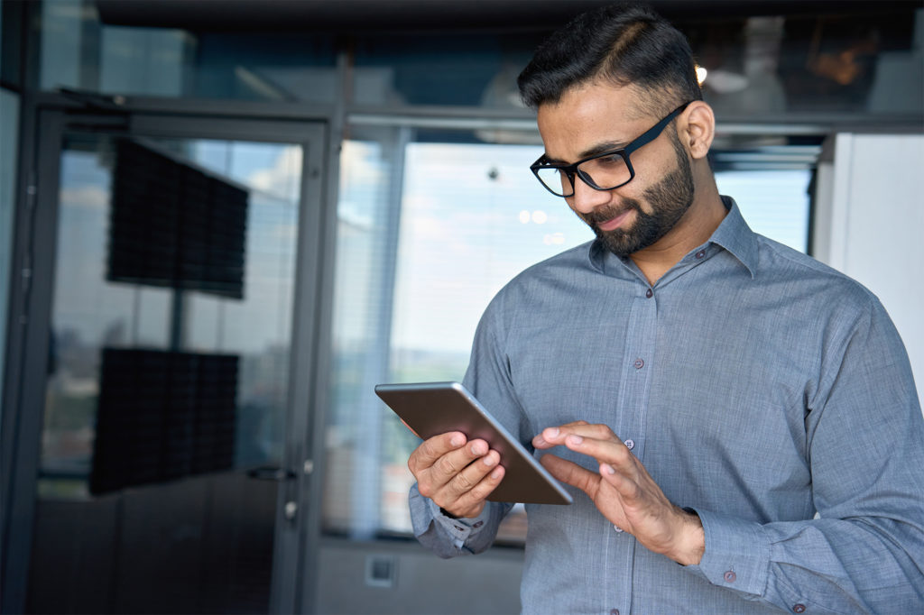 business man entering bulk payment information